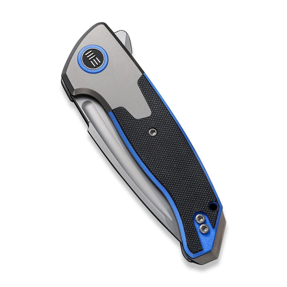 Джобен нож WE Knife Press Check с титаниева сива и черно-синя G10 дръжка и CPM 20CV стомана Джобен нож WE Knife Press Check с титаниева сива и черно-синя G10 дръжка и CPM 20CV стомана